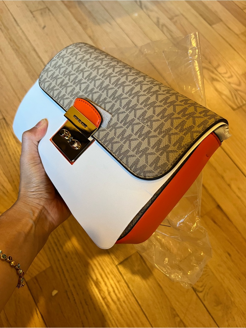 Michael Kors Monogram Shoulder Clutch in Orange and MK logos - Picture 3 of 4